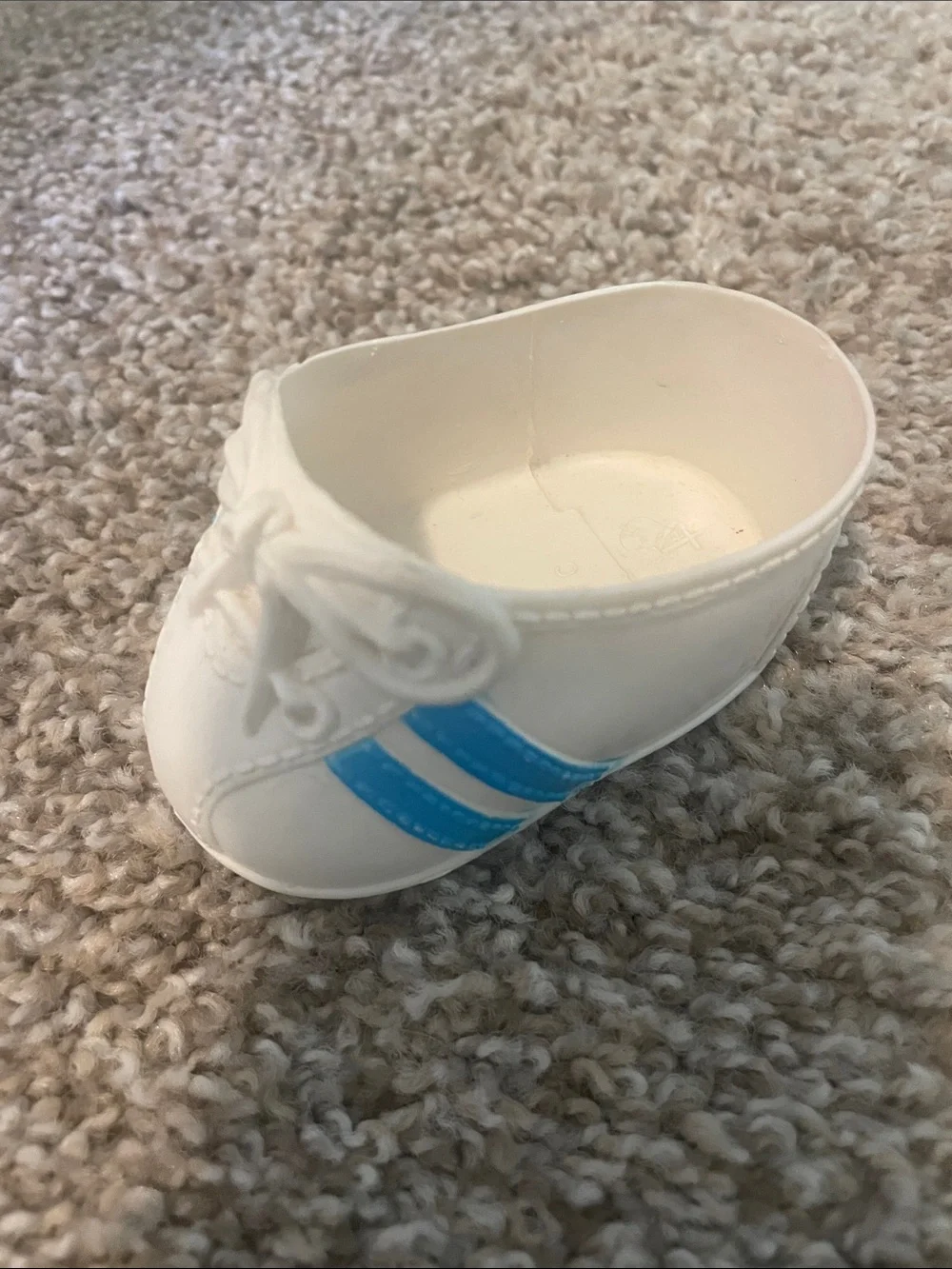 Vintage 1980s Cabbage Patch Kid blue striped sneaker.